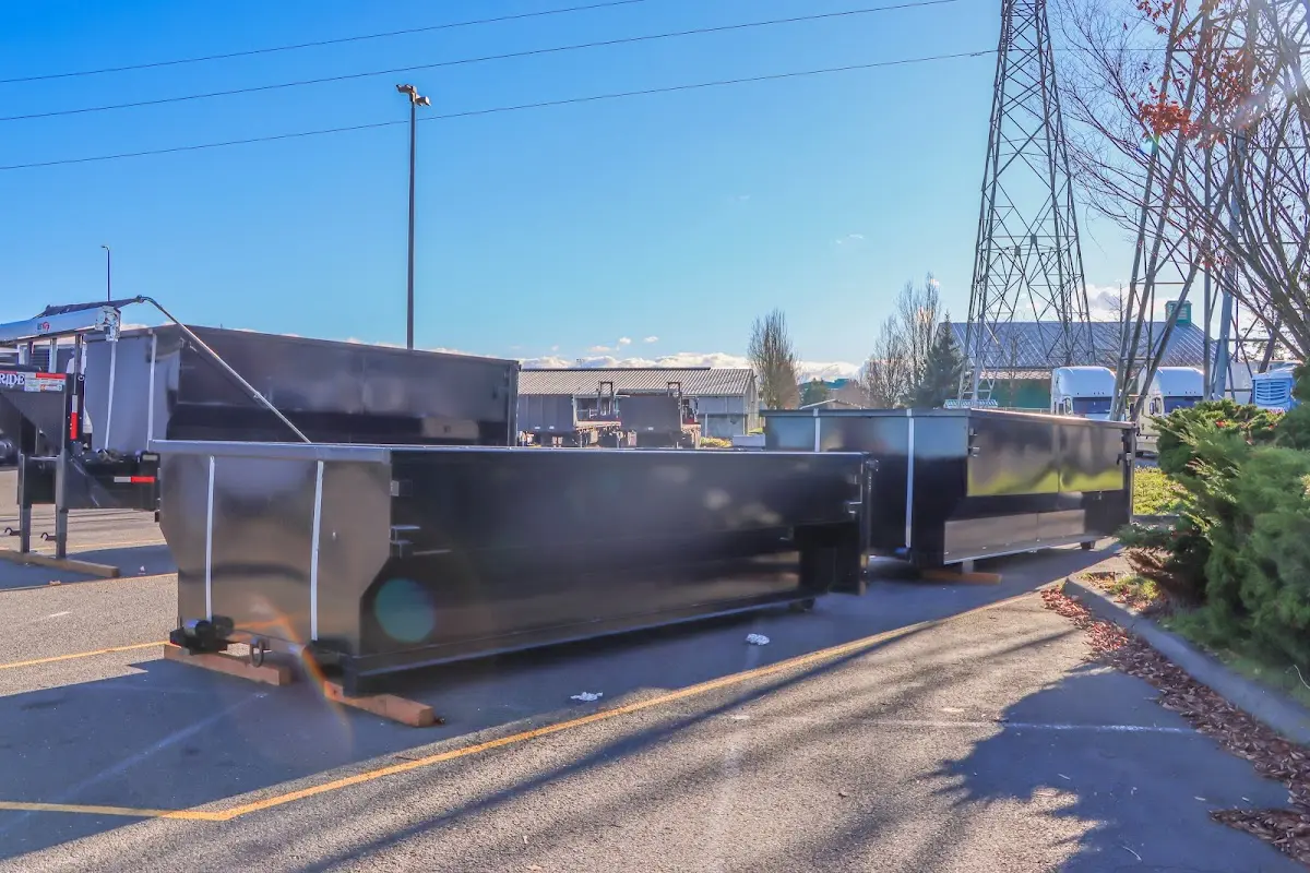 Roll-off dumpster ready for waste disposal at job site for Concrete Dumpster Rental in Brownfield
